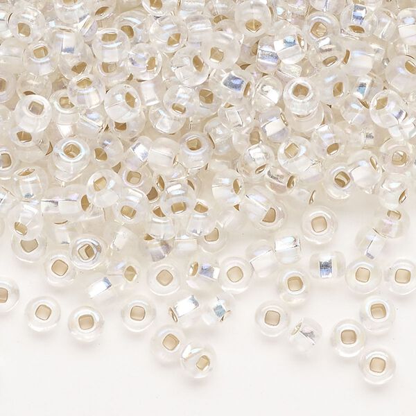 Seed bead, Preciosa Ornela Czech glass, pkg/50g, #6 rocaille, translucent silver-lined rainbow clear, (78109). image number 0