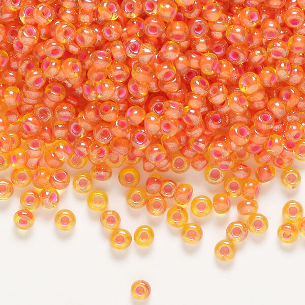 Seed bead, Preciosa Ornela, glass, translucent pink-lined luster yellow amber, #8 rocaille. Sold per 50-gram pkg. image number 0