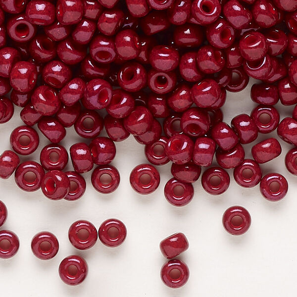 Seed bead, Miyuki, glass, pkg/25g, #6 rocaille, opaque outside dyed maroon, (RR-1464). image number 0