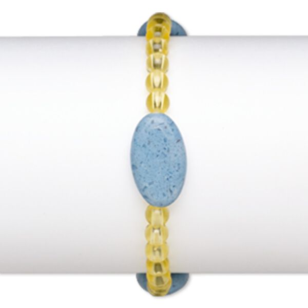 Bracelet, stretch, glass and acrylic, yellow and opaque blue, 5mm round and 23x13mm-23x14mm puffed oval, 7 inches. Sold individually. image number 0