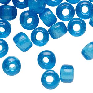 Bead, glass, transparent blue, 9x7mm crow. Sold per pkg of 100.