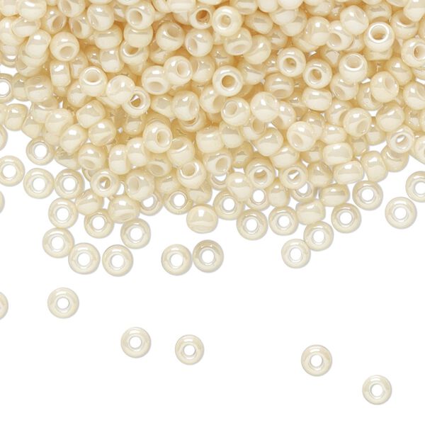 Seed bead, TOHO BEADS®, glass, pkg/50g, #8 round, opaque luster light beige (TR-08-123). image number 0