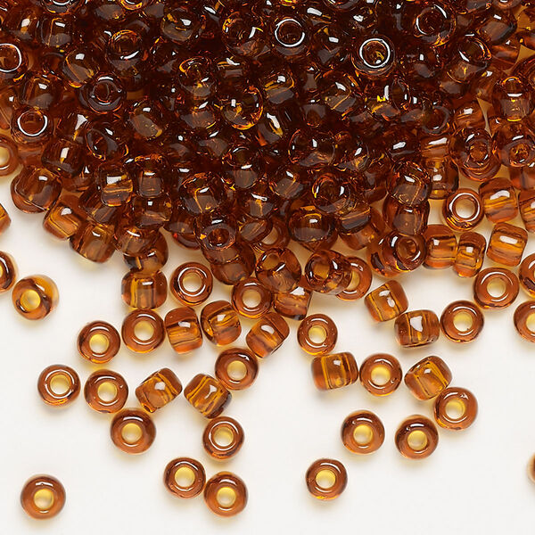 Seed bead, Dyna-Mites™, glass, transparent root beer, #6 round. Sold per 40-gram pkg. image number 0