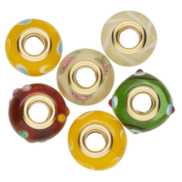 Bead, Dione®, lampworked glass and gold-finished brass grommets, transparent yellow and opaque multicolored, 12x8mm-16x9mm rondelle with assorted designs. Sold per pkg of 6. image number 0