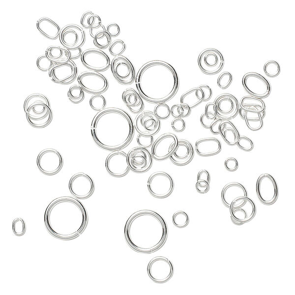 Jump ring mix, sterling silver, 3-10mm round with 1.4-7.6mm inside diameter and 4x3mm-7x5mm oval with 2.5x1.5mm-5x3.3mm inside diameter, 20-26 gauge. Sold per 5-gram pkg, approximately 75-85 jump rings. image number 1