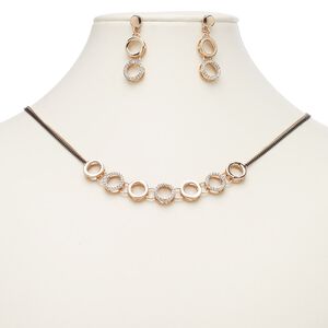 Necklace and earring set, crystals / rose gold-finished brass / "pewter" (zinc-based alloy) / antique brass-plated steel, crystal clear, 11mm open round, 18-inch necklace with 2-inch extender chain and lobster claw clasp, 37mm earrings with post. Sold per set.