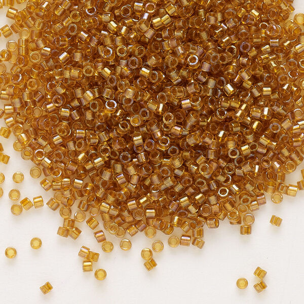 Seed bead, Delica®, glass, pkg/250g, #11 round, translucent topaz-lined luster topaz (DB-0065). image number 0