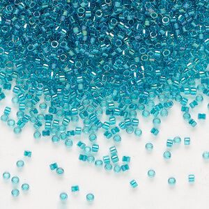 Seed bead, Delica®, glass, pkg/7.5g, #11 round, translucent teal-lined luster crystal clear (DB-2380).