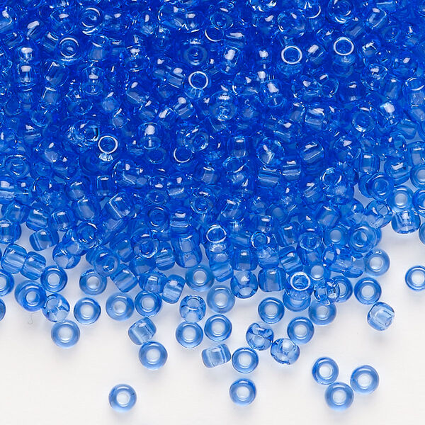 Seed bead, Dyna-Mites™, glass, transparent light cobalt blue, #8 round. Sold per 40-gram pkg. image number 0