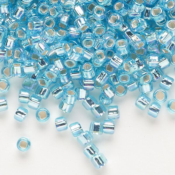 Seed bead, Dyna-Mites™, glass, silver-lined translucent rainbow light aqua, #6 round with square hole. Sold per 1/2 kilogram pkg. image number 0