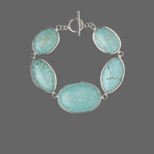 Bracelet, magnesite (dyed / stabilized) and brass, blue, 26x19mm-34x27mm oval and marquise, 7-1/2 inches with toggle clasp. Sold individually. image number 0