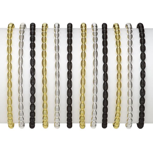 Bracelet, stretch, steel / gold-finished steel / silver-plated steel, black, 4mm wide with oval design, 7 inches. Sold per pkg of 12. image number 0