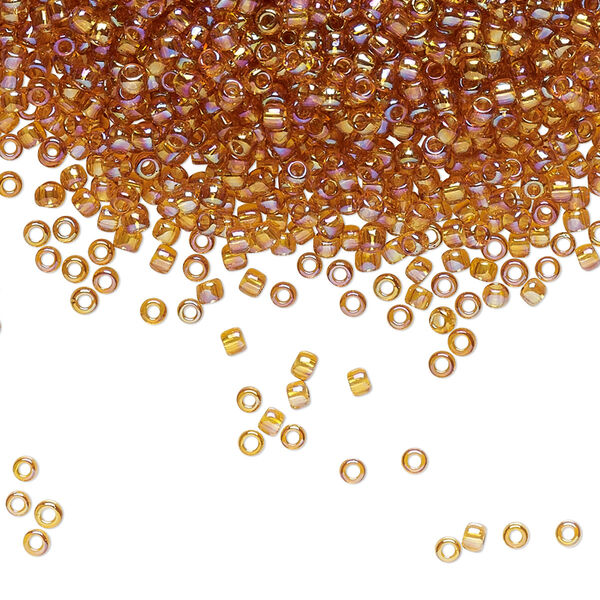 Seed bead, TOHO BEADS®, glass, pkg/7.5g, #11 round, translucent rainbow topaz (TR-11-162C). image number 0