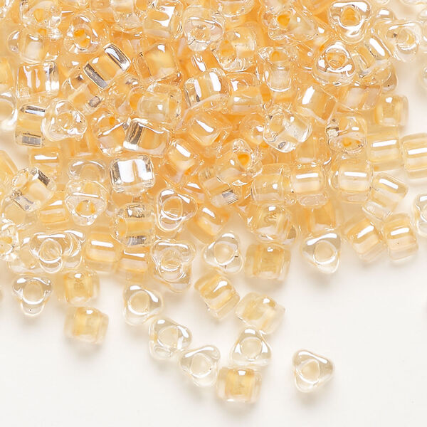 Seed bead, Miyuki 1pkg10g, glass, #5 triangle, transparent tawny inside dyed color clear (TR-1131) image number 0