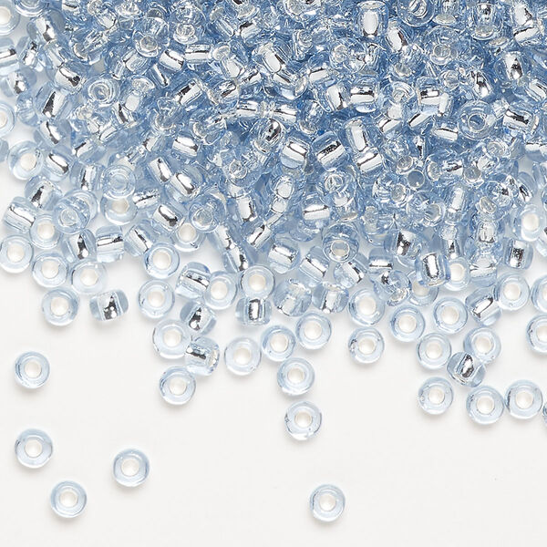 Seed bead, Dyna-Mites™, glass, silver-lined translucent light blue, #8 round. Sold per 40-gram pkg. image number 0