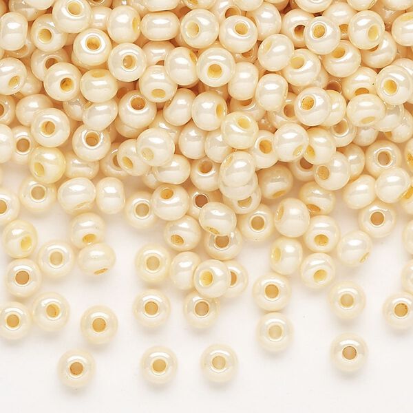 Seed bead, Preciosa Ornela Czech glass, pkg/50g, #6 rocaille, opaque dark shell luster chalkwhite, (46112). image number 0
