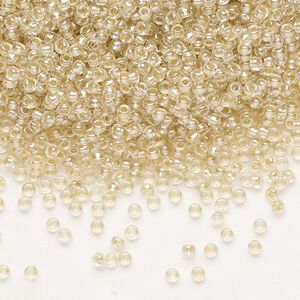 Seed bead, Preciosa Ornela, glass, translucent mocca pearl-lined crystal clear, #11 rocaille. Sold per 50-gram pkg.