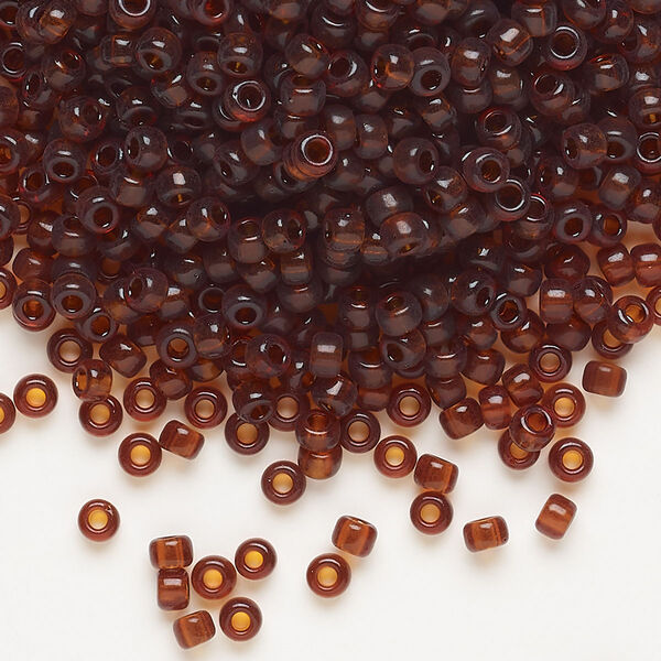 Seed bead, Miyuki, glass, pkg/250g, #8 rocaille, transparent dark topaz (RR-134). image number 0