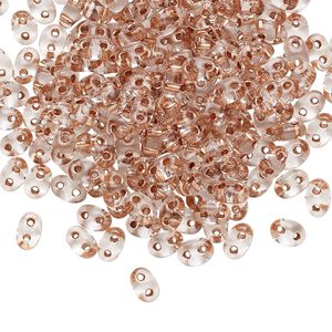 Seed bead, Preciosa Twin™ Czech glass, pkg/250g, 5x2.5mm oval, transparent copper color-lined clear, (68105).