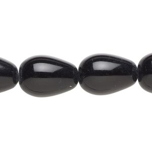 Bead, glass, transparent black, 17x11mm-18x13mm teardrop. Sold per 15-1/2" to 16" strand.
