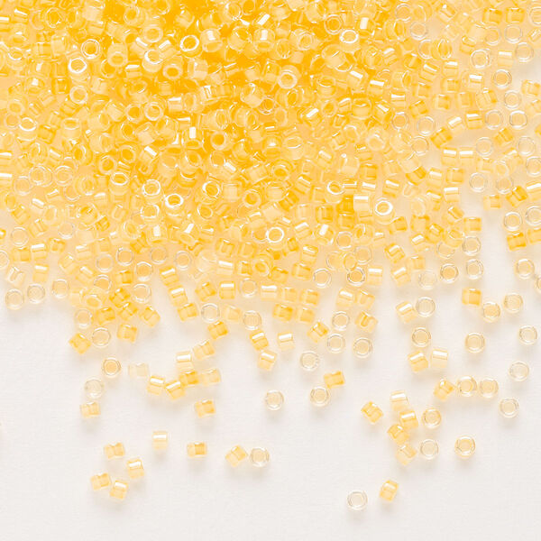 Seed bead, Delica®, glass, pkg/7.5g, #11 round, translucent luminous inside dyed color sun glow (DB-2032). image number 0