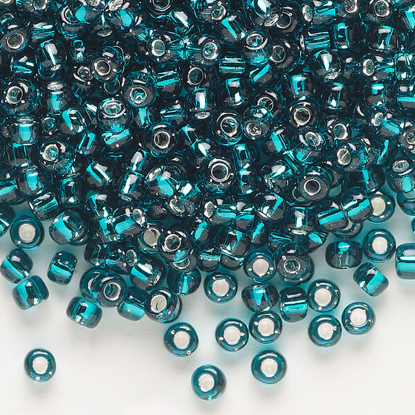 Seed bead, Dyna-Mites™, glass, transparent silver-lined teal, #6 round. Sold per 40-gram pkg. image number 0