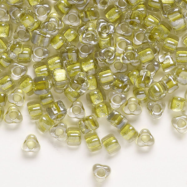 Seed bead, Miyuki, glass, transparent clear color-lined yellow green, (1125), #5 triangle. Sold per 250-gram pkg. image number 0