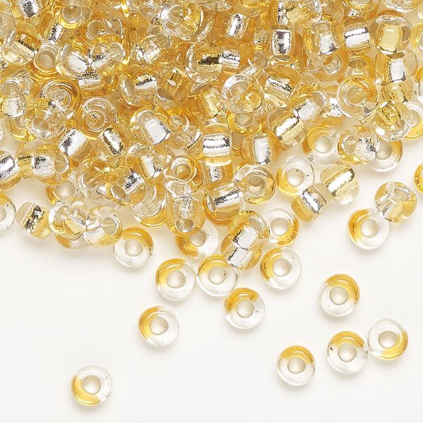 Seed bead, Miyuki, glass, pkg/25g, 4mm irregular round, transparent silver-lined light gold/clear, (TB-3931). image number 0