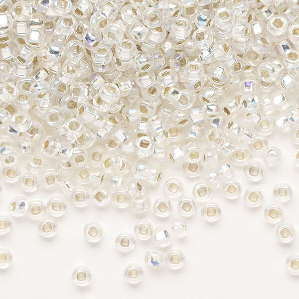 Seed bead, Preciosa Ornela Czech glass, pkg/500g, #8 rocaille, translucent silver-lined rainbow clear, (78109). image number 0