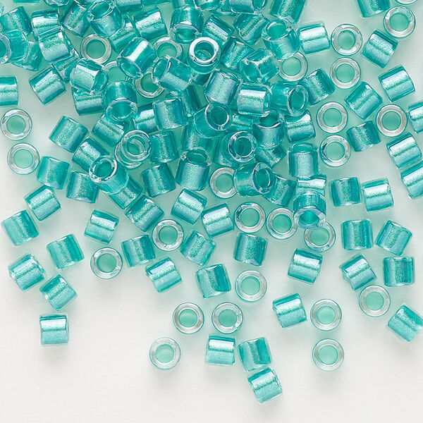 Seed bead, Delica®, glass, pkg/7.5g, #8 round, translucent teal green-lined luster crystal clear (DBL-0904). image number 0