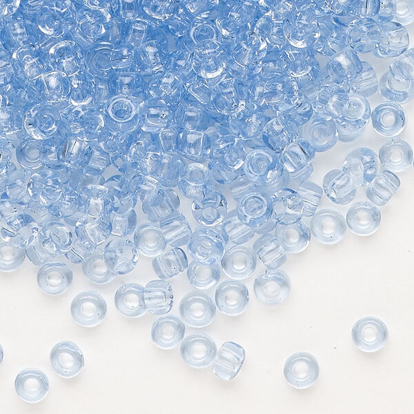 Seed bead, Dyna-Mites™, glass, transparent pale blue, #6 round. Sold per 40-gram pkg. image number 0