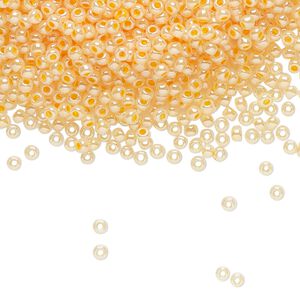 Seed bead, TOHO BEADS®, glass, pkg/50g, #11 round, opaque ceylon apricot (TR-11-904).