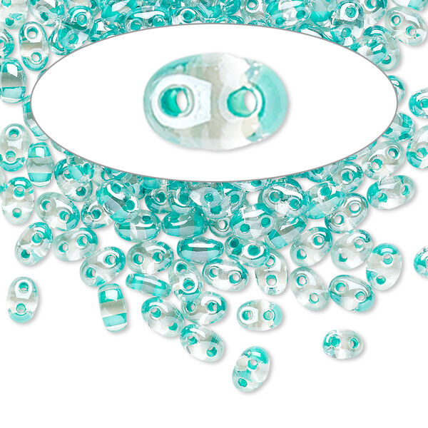 Seed bead, Preciosa Twin™ Czech glass, pkg/50g, 5x2.5mm oval, transparent green terra color-lined clear, (38658). image number 0