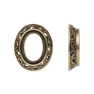 Component, antique gold-plated brass, 22x18.5mm oval with swirl design and 16x12mm oval setting. Sold per pkg of 4.