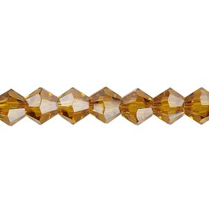 Bead 1pk transparent gold, Celestial Crystal® 8mm bicone 15.5-16 inch