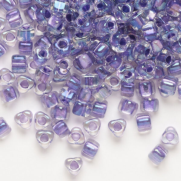 Seed bead, Miyuki, glass, transparent purple color-lined dark lilac, (TR1138), #5 triangle. Sold per 250-gram pkg. image number 0