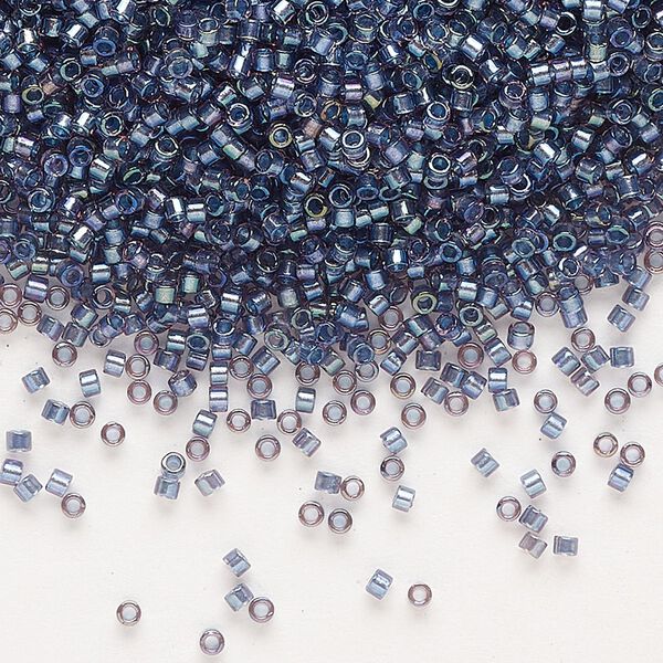 Seed bead, Delica®, glass, pkg/7.5g, #11 round, translucent tidal-lined luster crystal clear (DB-2387). image number 0