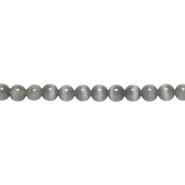 Bead, cat's eye glass (fiber optic glass), opaque black, 4mm round, quality grade. Sold per 15-1/2" to 16" strand. image number 0