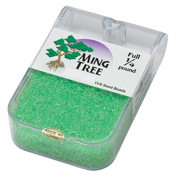 Seed bead, Ming Tree™, glass, pkg/1/4 pound, #11 round, transparent color-lined bright green. image number 0