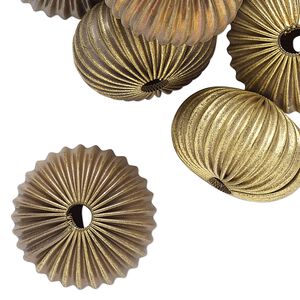 Bead, raw brass, 21x13mm- 22x14mm corrugated rondelle with 3.5mm hole. Sold per pkg of 24.