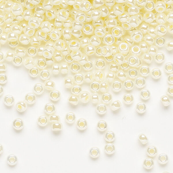 Seed bead, Miyuki, glass, pkg/250g, #8 rocaille, opaque butter cream luster alabaster (RR-527). image number 0