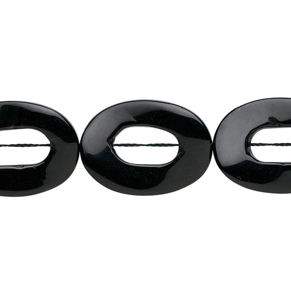 Bead, black onyx (dyed), 30x22mm twisted oval go-go, B grade, Mohs hardness 6-1/2 to 7. Sold per 16-inch strand. image number 0