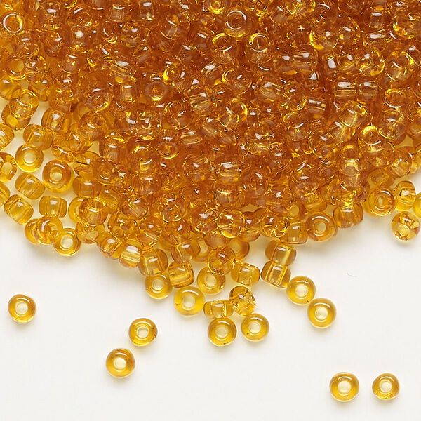 Seed bead, Dyna-Mites™, glass, transparent amber yellow, #8 round. Sold per 40-gram pkg. image number 0
