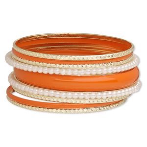 Bracelet, bangle, enamel / acrylic / gold-finished steel, white and orange, 3-11mm wide, 8-1/2 inches. Sold per 9-piece set.
