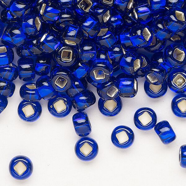 Seed bead, Preciosa Ornela, glass, transparent silver-lined blue, #2 rocaille with square hole. Sold per 50-gram pkg. image number 0