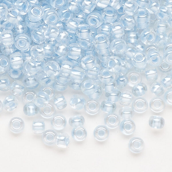 Seed bead, Preciosa Ornela Czech glass, pkg/50g, #6 rocaille, translucent color-lined luster pastel blue, (382PB). image number 0