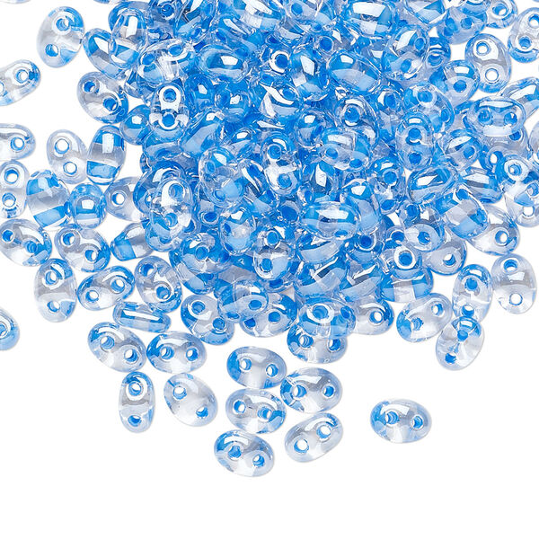 Seed bead, Preciosa Twin™ Czech glass, pkg/10g, 5x2.5mm oval, transparent sea blue terra color-lined clear, (38636). image number 0