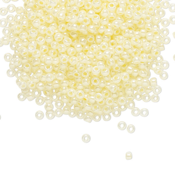 Seed bead, TOHO BEADS®, glass, pkg/7.5g, #11 round, translucent ceylon banana cream (TR-11-142). image number 0