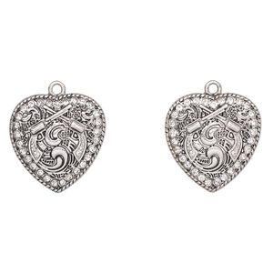 Charm, antique silver-finished "pewter" (zinc-based alloy) and glass, clear, 23x22mm heart with pistols. Sold per pkg of 2.