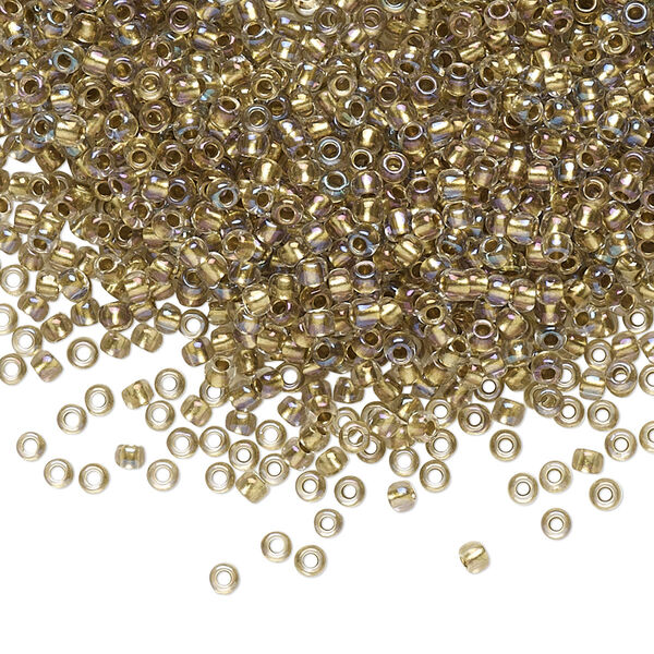 Seed bead, TOHO BEADS®, glass, pkg/7.5g, #11 round, translucent gold-lined rainbow crystal clear (TR-11-262). image number 0